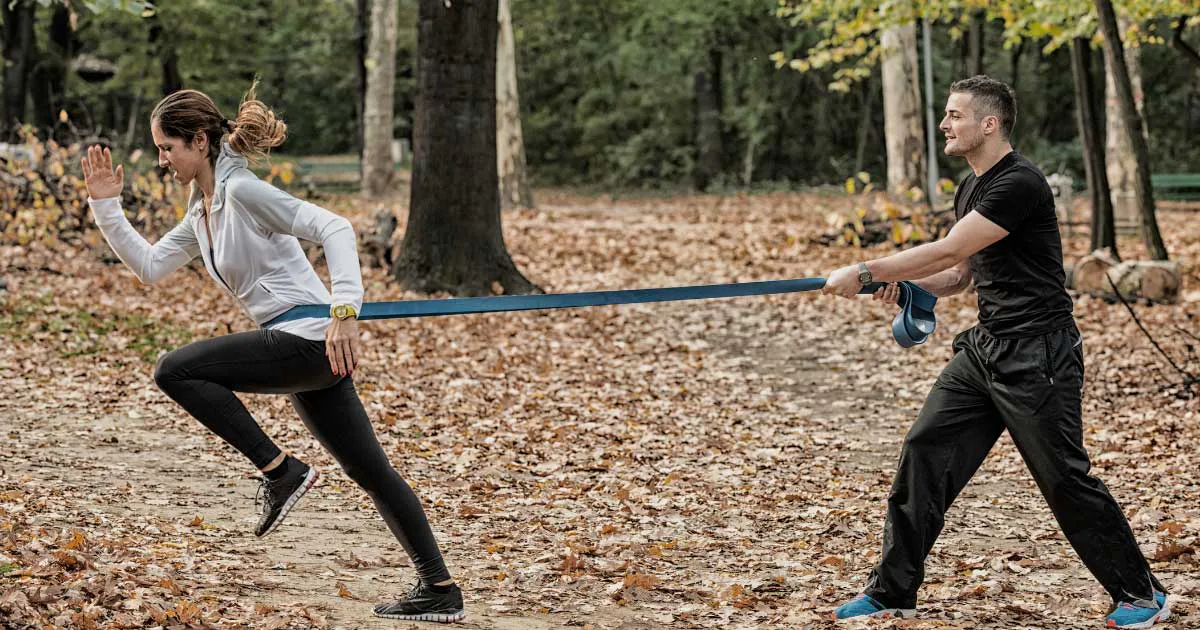 Banded Partner Run A Resistance Band Partner Workout For Couples Down to Sweat Together