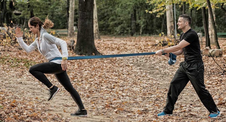 couple work out with resistance band