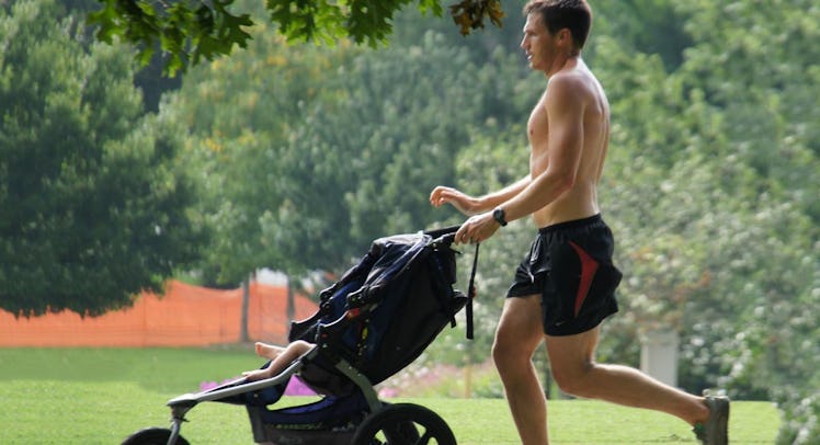 dad jogging with stroller