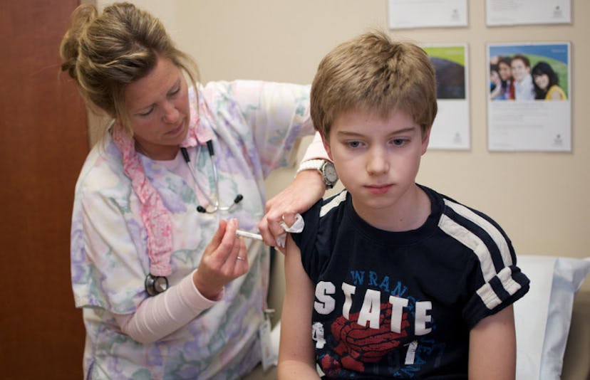 kid receiving vaccination