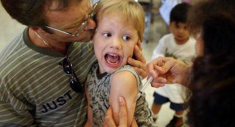 child receiving vaccination
