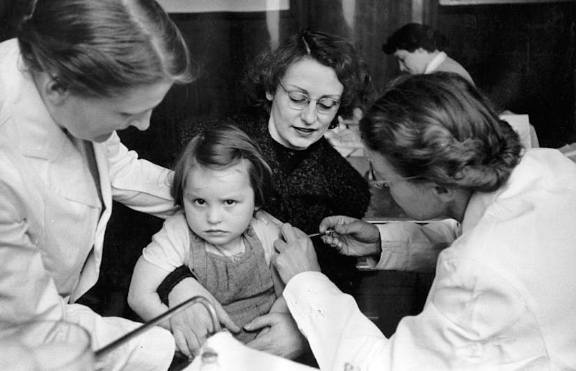 girl receiving vaccination