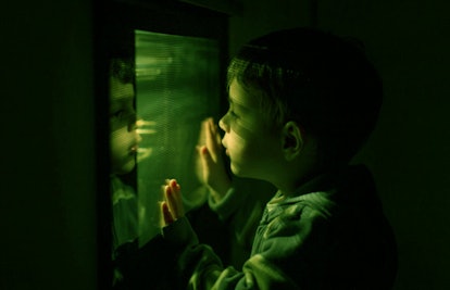 toddler looking at green light