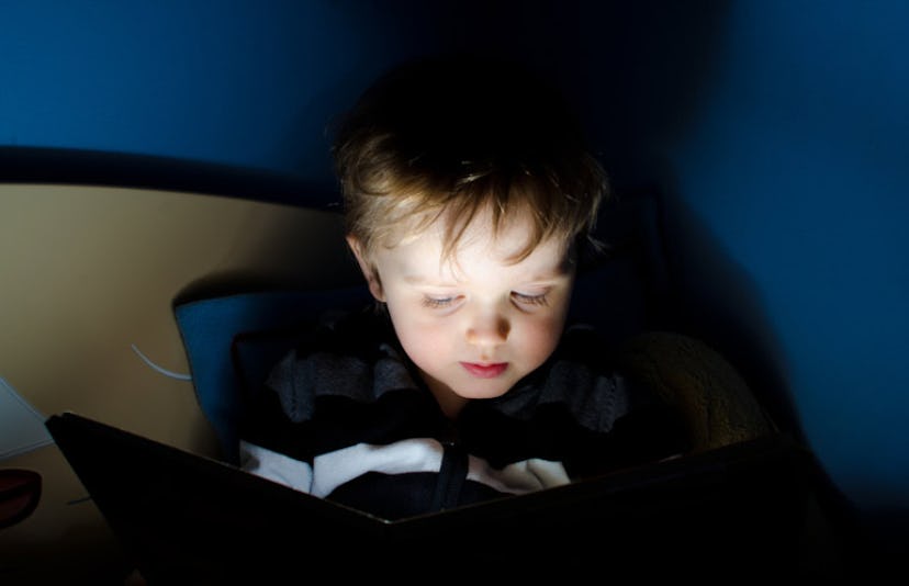 toddler reading at night