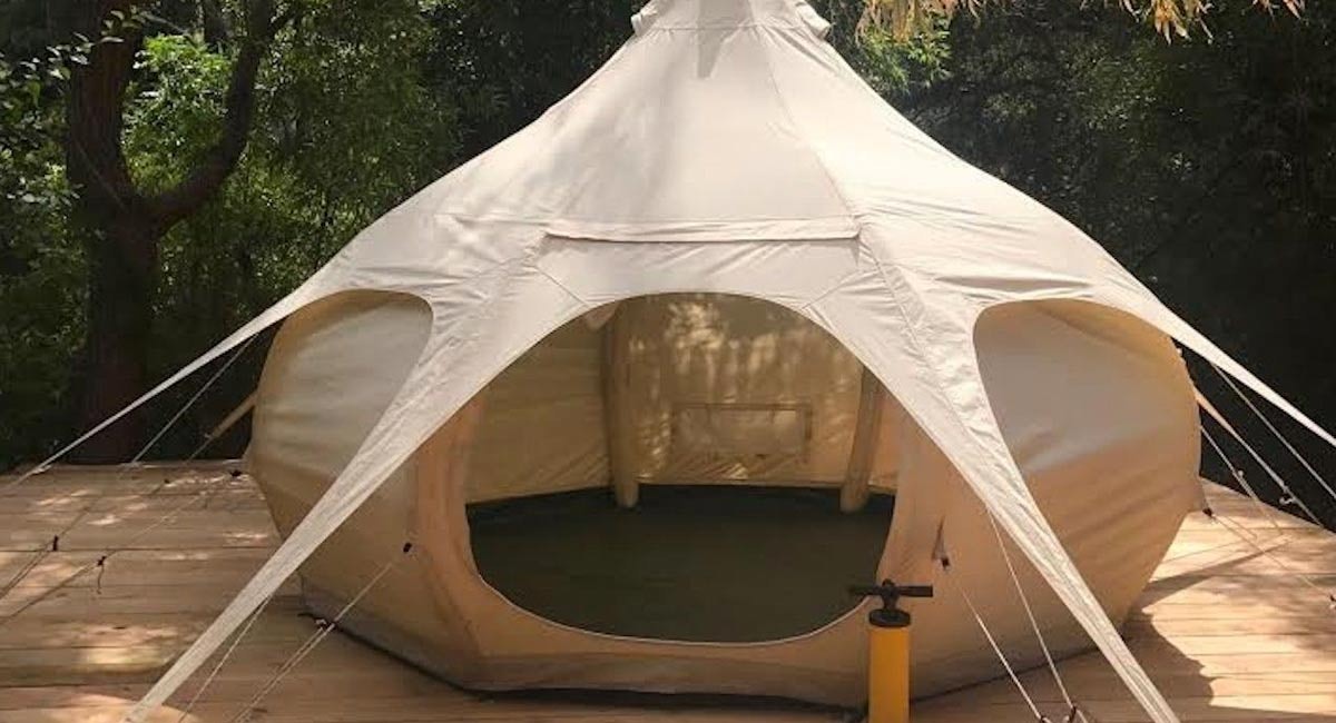 Inflatable bell outlet tent