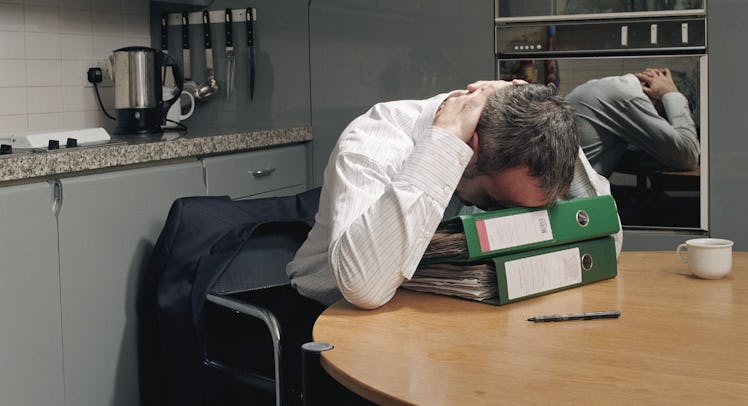 stressed man working from home