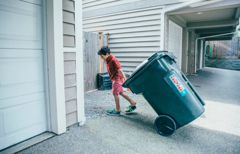kid taking out the trash