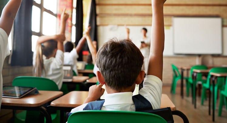 Young kids sitting in class at the beginning of the school year