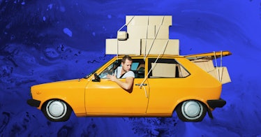 man with overweight boxes loaded on yellow car looks out the window