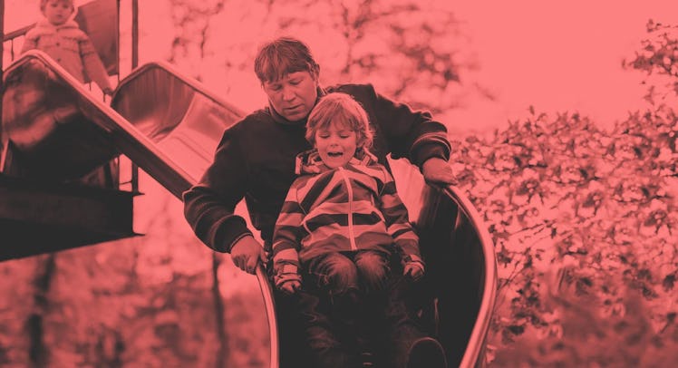 dad on slide with toddler