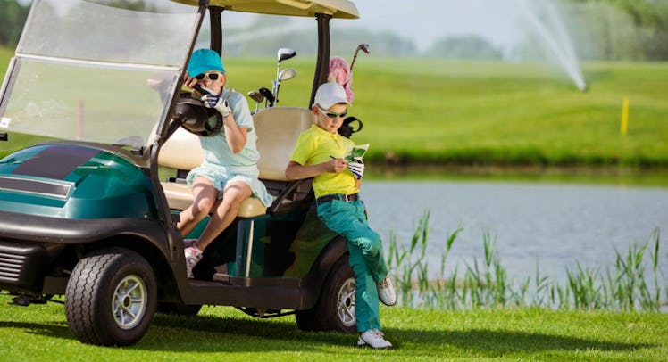 kids in golf cart