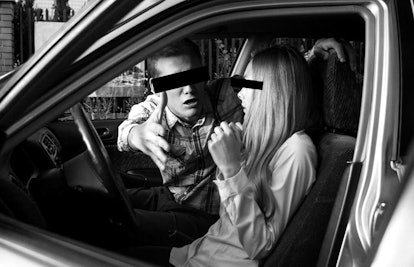 couple arguing in car
