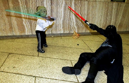 father and son in star wars attire