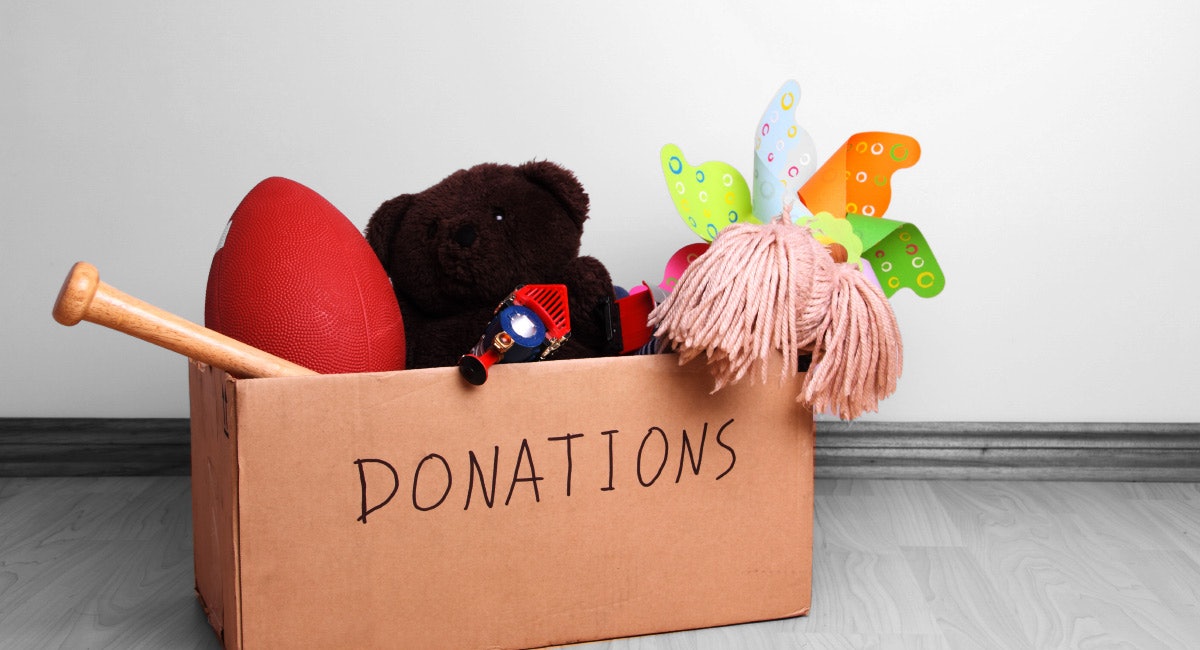 How to Talk to Kids About Donating or Throwing Out Their Old Toys