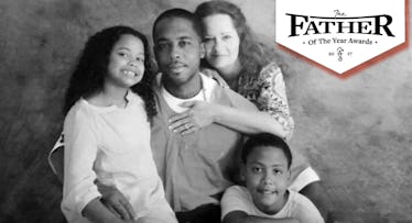 A father posing for a photo with his wife, son, and daughter and the text 'Father of the year'