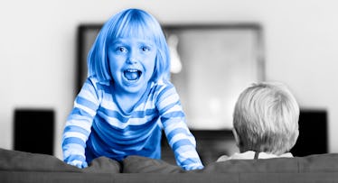 blue photo edit of a girl standing on a sofa next to her sibling