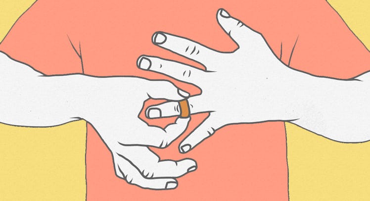 An illustration of a divorced man in a red shirt taking off his wedding ring