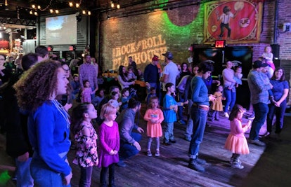 Kids and their parents at the Rock and Roll Playhouse