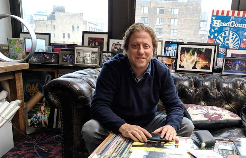 Peter Shapiro in an office full of pictures in the background