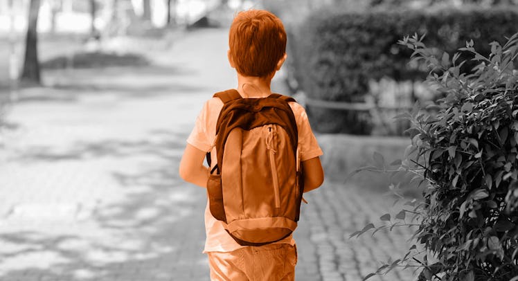 playing alone outdoors