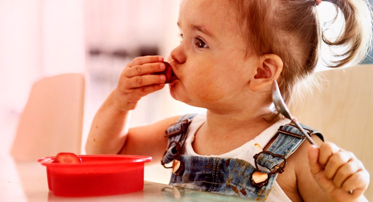 USDA child eating fruit