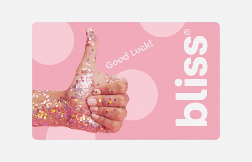 A Spa Massage pink coupon with glitter and a hand showing thumbs up 
