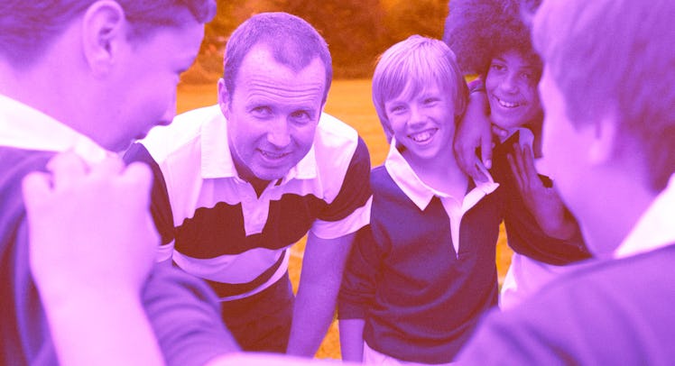 A man who is coaching youth sports surrounded by four boys with a purple and orange color filter