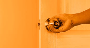orange edit of parent's hand on the door knob of a toddler's door