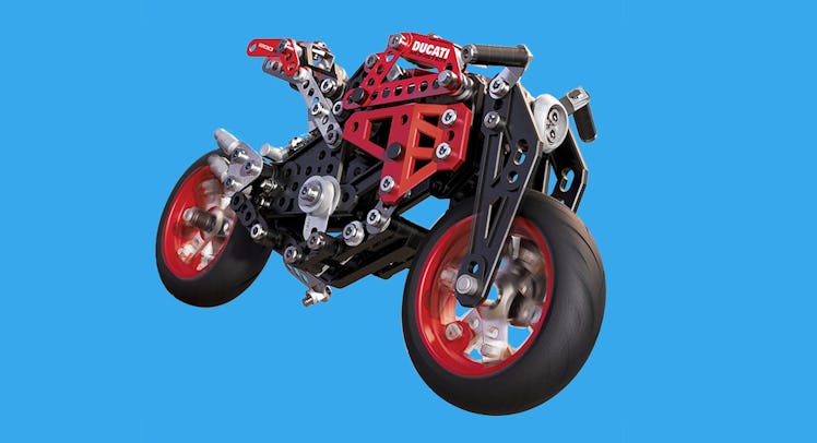 A red Ducati Erector on a blue background