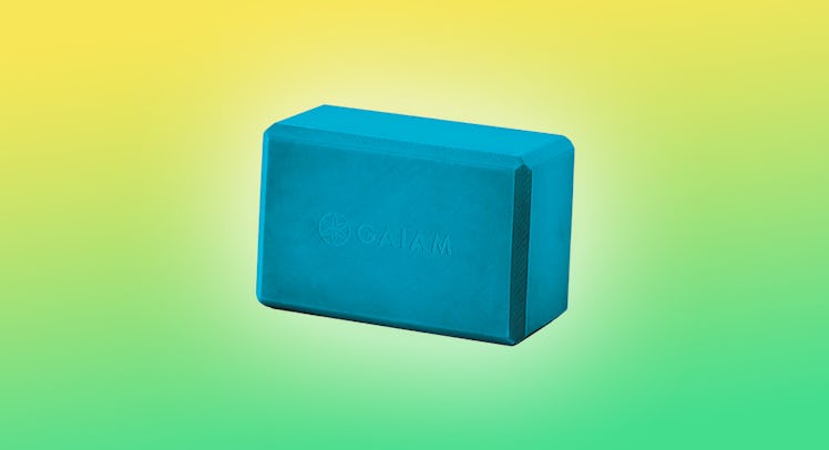 A blue Gaiam yoga block