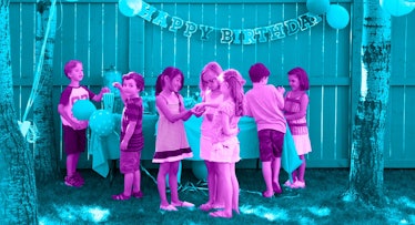 Seven kids standing outside next to a table with snacks during a summer birthday party