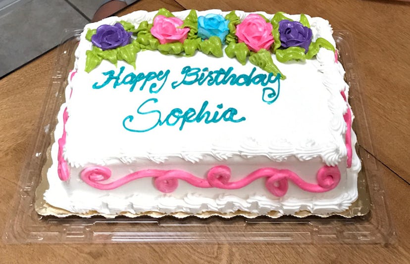 A sheet cake with "Happy Birthday Sophia" on it