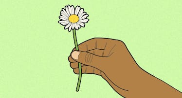 hand holding flower sweetly for mother's day