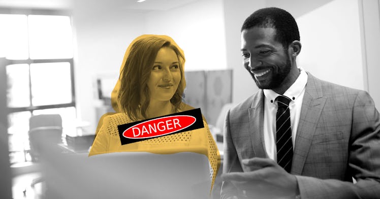 a black and white photo edit of coworkers getting too close in danger of having an affair