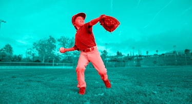 A young boy playing baseball on a field