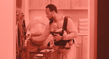 A dad using a baby carrier to hold his baby while he cleans the house. red color filter