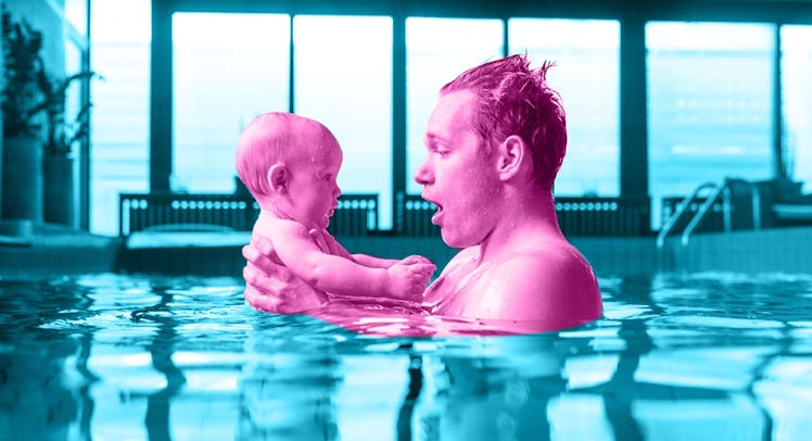 A father holding his little baby while standing in a pool