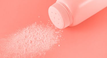 pink photo edit of a container of baby powder spilling out onto a table