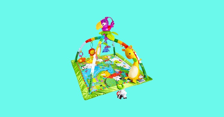 best baby play mat and activity mat against a teal background