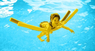 A kid playing with a Pool Noodle