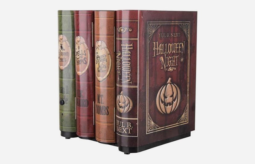 The Horror Dome Animated Haunted Books featuring four books stacked together