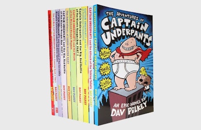 The books from The Captain Underpants Series by Dave Pilkey all stacked up against each other 