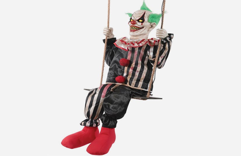 The Horror Dome Swinging Chuckles the Clown in black, white and red clothes and green hair