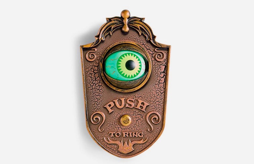 The Grandin Road Animated Eyeball Doorbell with a single green eye and the text 'Push to ring'