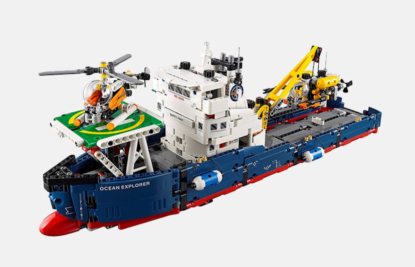 Lego Ocean Explorer ship with a helipad and helicopter on the fore, functioning crane on the aft and...