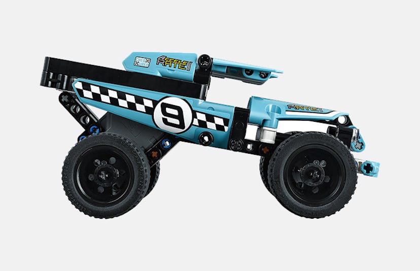 Lego stunt truck in light blue with the number 9 on the side. 