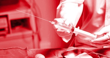 a black and red photo with someone holding a syringe