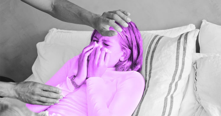 A girl with pneumonia symptoms lying in bed, blowing her nose