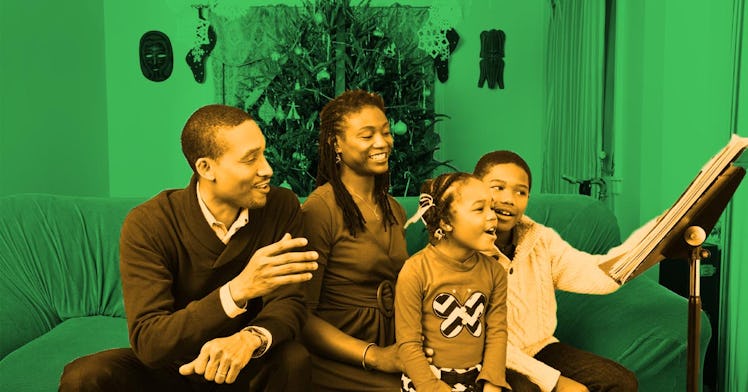 Parents singing Christmas Carols with their kids