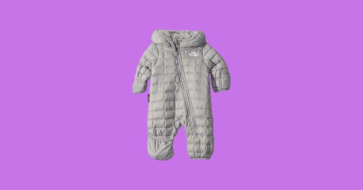 The best infant snowsuits and buntings, set against a blue backdrop, keep your children warm in cold...